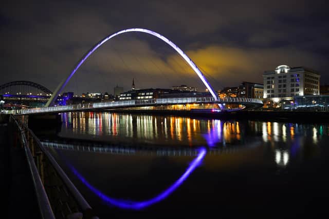 The Millennium Bridge in Newcastle is bathed in purple light to commemorate Holocaust Memorial Day on January 27.