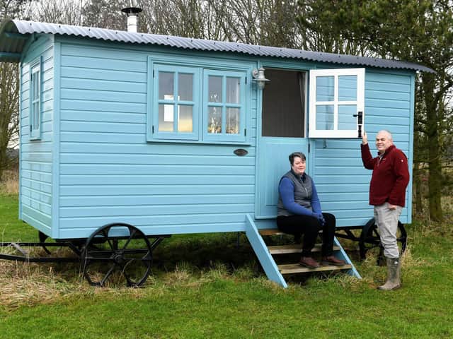 Iain and Katie Ogilvie with their shepherd's hut