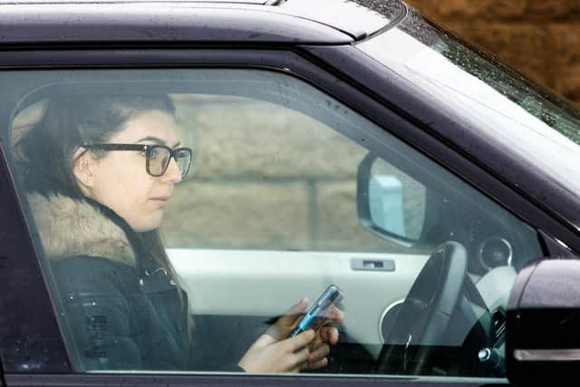 Sinead Quinn, the owner of Quinn Blakey Hairdressing, arrived at the salon at 9.20am today but drove off after 30 minutes (Photo: Danny Lawson/PA Wire)
