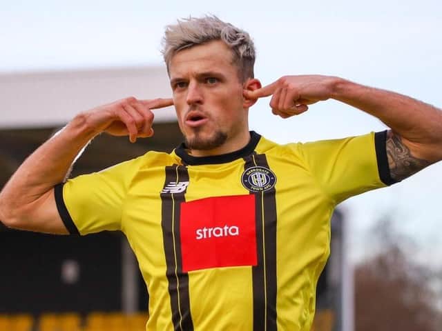 Josh March celebrates after firing in Harrogate Town's 34th-minute equaliser against Newport County. Pictures: Matt Kirkham