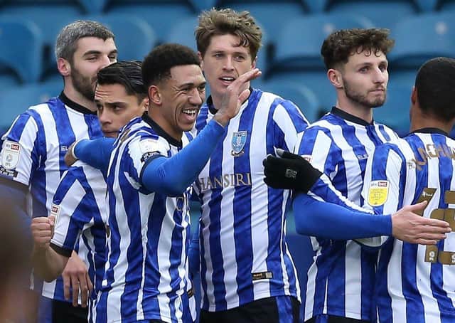 Sheffield Wednesday's Liam Palmer (third left) celebrates with team-mates after his winning goal. Picture: PA