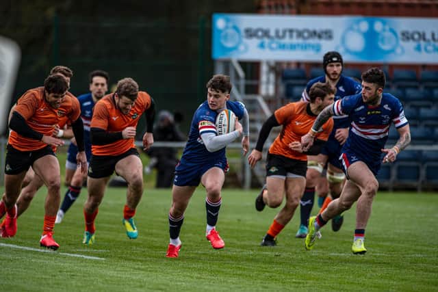 On-loan Wasps full-back Tom Bacon races away for Doncaster Knights' opening try. (PIC: TONY JOHNSON)