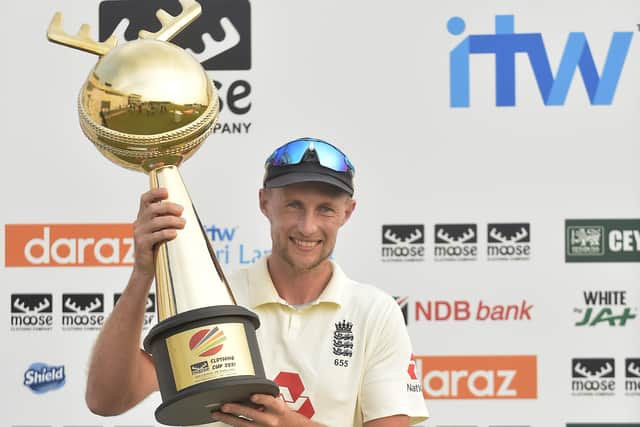 Joe Root, the England captain holds the 'Moose Clothing Cup 2021' on day four of the second Test match between Sri Lanka and England at Galle (
Picture: Sri Lanka cricket via ECB)