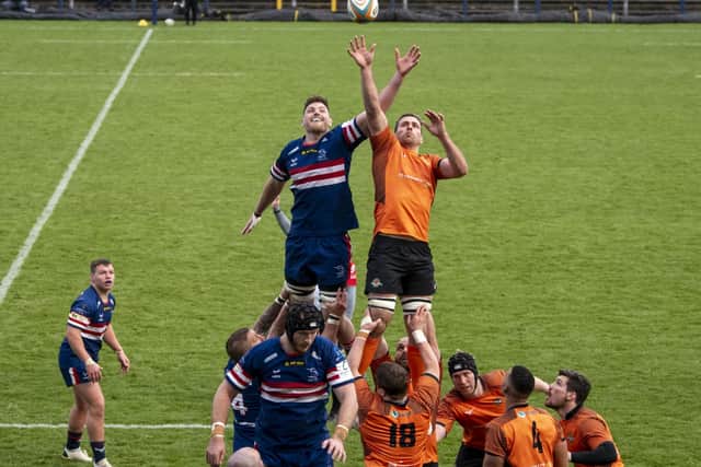 Doncaster Knights' Matt Smith competes with Trailfinders captain Rayn Smid at the lineout. Picture Tony Johnson