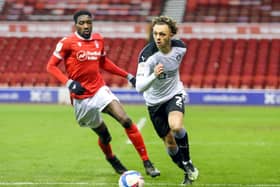 Barnsley's Jordan Williams gets away from Nottingham Forest's Sammy Ameobi (left) during the Sky Bet Championship match at the City Ground (Picture: Isaac Parkin/PA Wire)