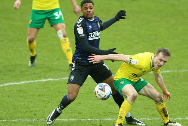 Middlesbrough's Chuba Akpom and Norwich City's Oliver Skipp (right) battle for the ball (Picture: PA)