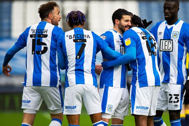 Pipa celebrates his opening goal for Huddersfield Town against Stoke City (Picture: Bruce Rollinson)