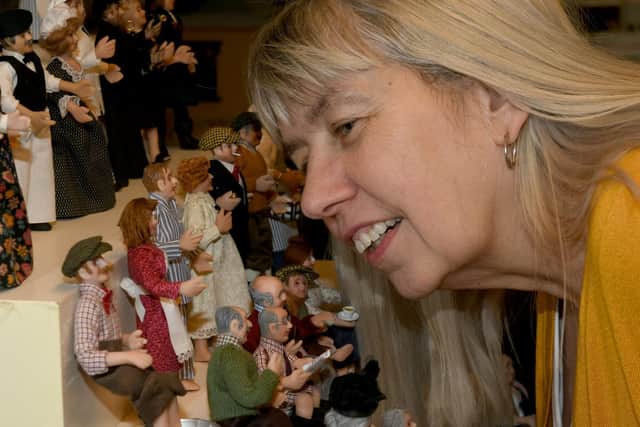 Pauline Millard with some of the one 1/12th scale character dolls she makes from modelling clay at Weaverthorpe Dolls House and Miniatures. Image: Gary Longbottom.