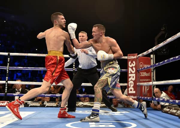 Josh Warrington on his way to beating Sofiane Takoucht at Leeds Arena in October 2019. Picture: Steve Riding.