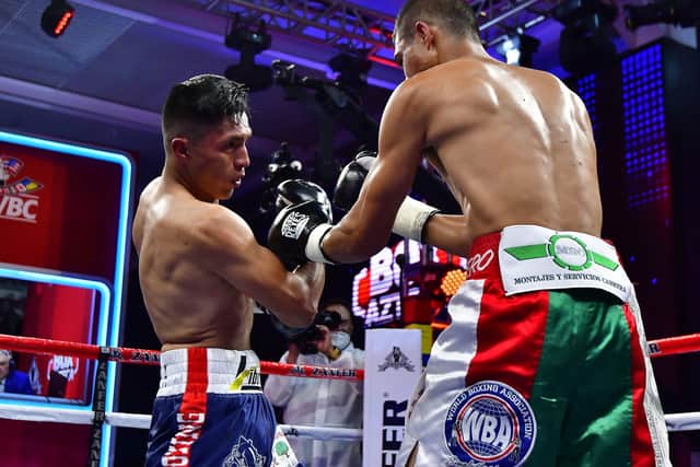 CHALLENGER: Mauricio 'Bronco' Lara battles with Alejandro 'Piston' Palmero in Mexico City in July last year. Picture: Jaime Lopez/Jam Media for Zanfer/Getty Images
