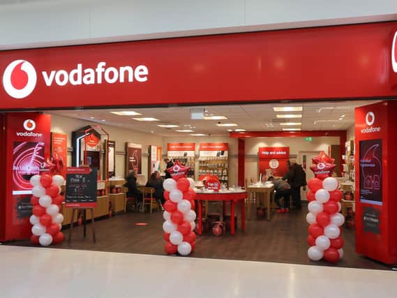 Telecoms giant Vodafone has reported a slump in revenues for the past three months as the coronavirus pandemic impacted roaming revenues.
