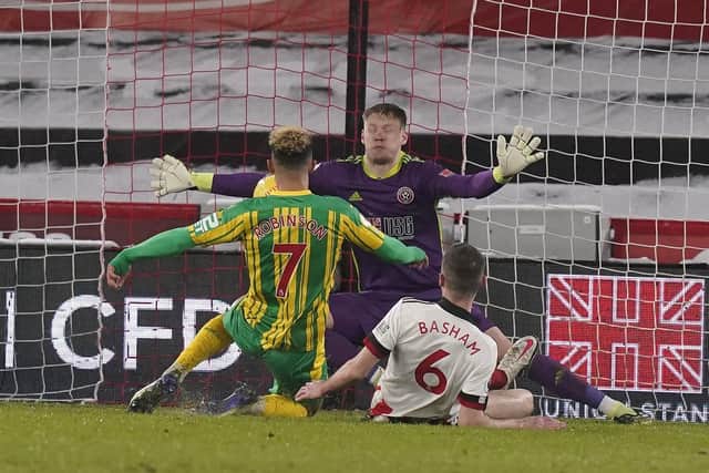 Aaron Ramsdale of Sheffield Utd saves from West Brom's Callum Robinson. Picture: Andrew Yates/Sportimage