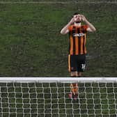 Hull City substitute Jordan Flores cannot hide his dismay after missing the decisive spot-kick in his side's Papa John's Trophy defeat to Lincoln City. Pictures: Getty Images