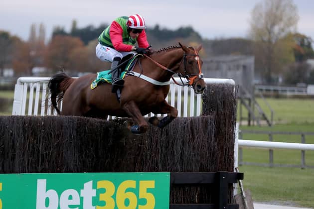 This was Definitly Red winning the 2018 Charlie Hall Chase under Danny Cook.