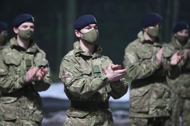 Junior soldiers at the Army Foundation College in Harrogate, North Yorkshire, joining in with a nationwide clap in honour of Captain Sir Tom Moore.