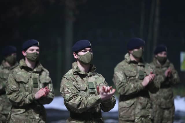 Junior soldiers at the Army Foundation College in Harrogate, North Yorkshire, joining in with a nationwide clap in honour of Captain Sir Tom Moore, the 100-year-old charity fundraiser who died last Tuesday after testing positive for Covid-19.