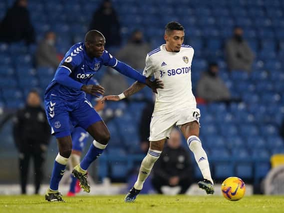 Leeds United winger Raphinha holds off Everton's Abdoulaye Doucoure at Elland Road. Picture: Tim Keeton/PA Wire.