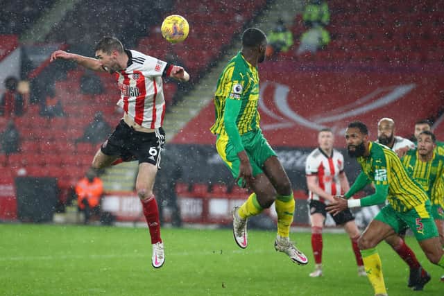 IN FORM: Sheffield United's Chris Basham, left, excelled during the Premier League clash with West Brom at Bramall Lane. Picture: Simon Bellis/Sportimage