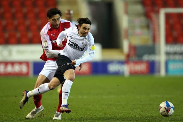 Rotherham United's Matt Crooks battles with Derby County's Patrick Roberts (right) . Picture: Nigel French/PA