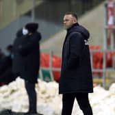 UNIMPRESSED: Derby County manager Wayne Rooney prowls the touchlineat the AESSEAL New York Stadium on Wednesday. Picture: Nigel French/PA