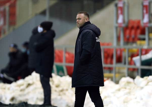 UNIMPRESSED: Derby County manager Wayne Rooney prowls the touchlineat the AESSEAL New York Stadium on Wednesday. Picture: Nigel French/PA