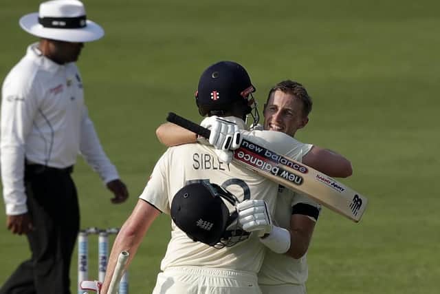 Joe Root is congratulated by Dom Sibley after reaching his century in Chennai. Picture courtesy of BCCI (via ECB)