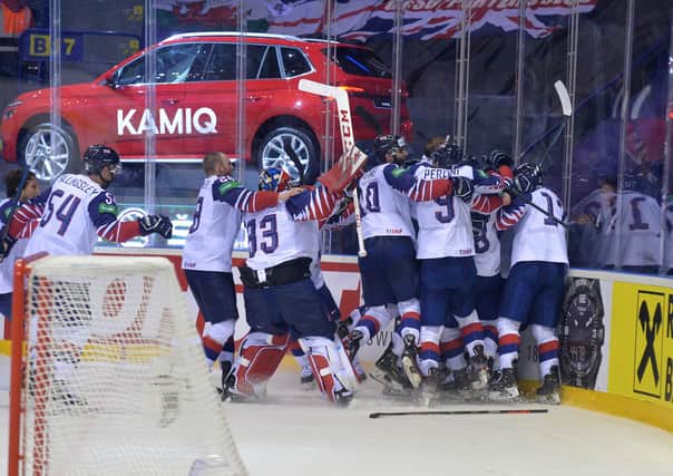 GB'splayers celebrate their stunning 4-3 win in overtime against France two years ago. Picture: Dean Woolley.