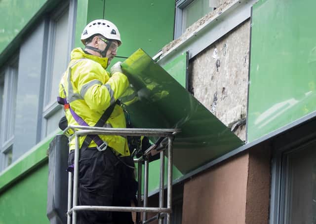 Pictures of cladding being removed from a Sheffield tower block in the wake of the Grenfell tragedy.