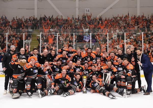 Sheffield Steelers celebrate their Challenge Cup Final triumph in March last year - their last game before the pandemic caused the sport to shut down. Picture courtesy of Dean Woolley/EIHL.