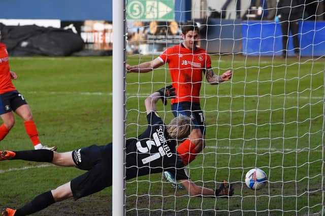 OPENER: James Collins celebrates scoring their first goal at Kenilworth Road. Picture: Getty Images.