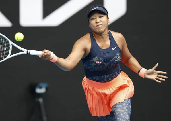 Japan's Naomi Osaka makes a forehand return to Russia's Anastasia Pavlyuchenkova during their first round match in Melbourne. Picture: AP/Rick Rycroft