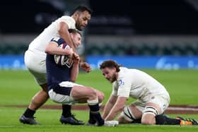 BAD DAY: Scotland's Finn Russell (centre) is tackled by England's Billy Vunipola (left) and Jonny Hill, resulting in a yellow card for Vunipola at Twickenham. Picture: David Davies/PA