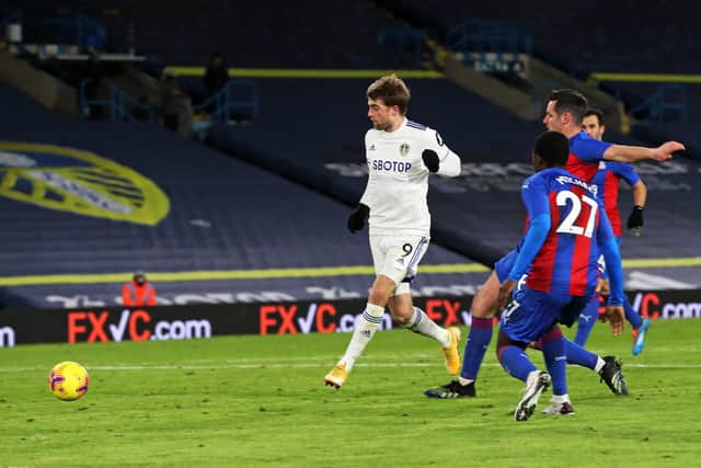 Patrick Bamford stirkes Leeds' second goal against Crystal Palace at Elland Road.  Picture Bruce Rollinson