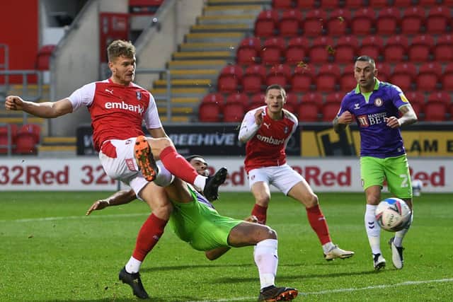 Rotherham's Michael Smith holds off  Bristol City's Zak Vyner to score his side's second goal in December. Picture: Jonathan Gawthorpe
