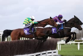 Festival glory: Champ ridden by jockey Barry Geraghty (left) on their way to winning the RSA Insurance Novices' Chase during day two of the 2020 Cheltenham Festival. Picture: Simon Cooper/PA Wire.