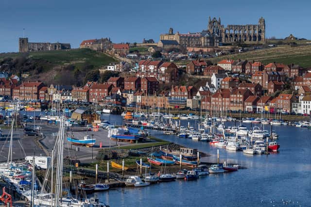 A view looking along the River Esk towards Whitby, with Whitby Abbey positioned over looking the seaside town. Picture: James Hardisty