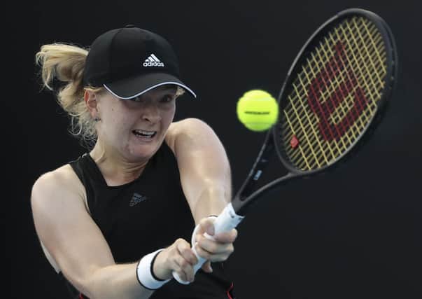 Britain's Francesca Jones makes a backhand return to Shelby Rogers during their first round match at the Australian Open in Melbourne. Picture: AP/Hamish Blair)