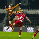 League One action: Hull City's Keane Lewis-Potter challenges Doncaster Rovers' Brad Halliday.  Picture: Tony Johnson