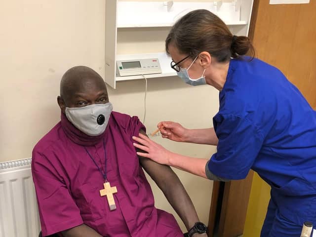 The  former Archbishop of York Dr John Sentamu, pictured yesterday being vaccinated by Nurse Christine. Photo credit: Submitted picture