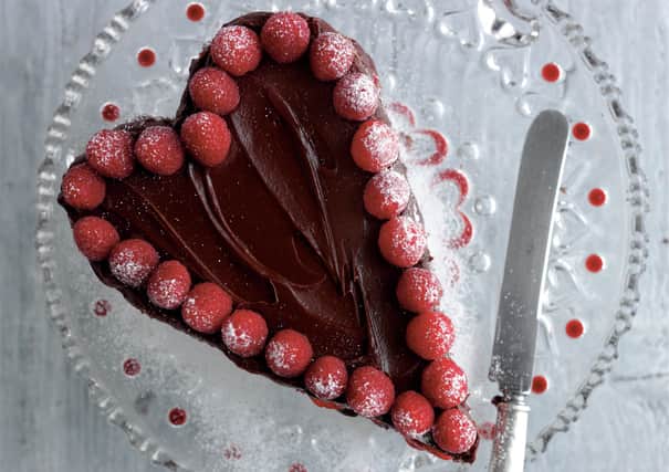 Special romantic heart-shaped Valentine's berry cake