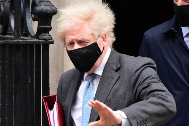 Prime Minister Boris Johnson leaves Downing Street for PMQs. Photo: PA