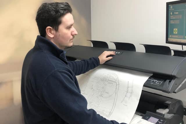 Scanning a V4 drawing at the data company Cleardata. Picture: A1SLT