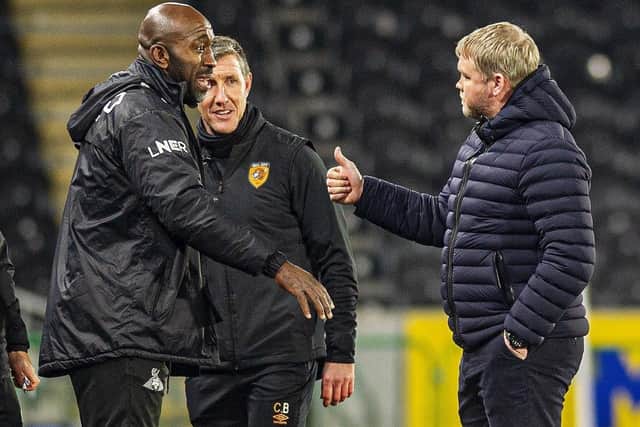 Rival managers Darren Moore and Grant McCann have put their teams into contention for promotion to the Championship. Picture: Tony Johnson