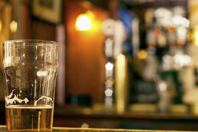A Generic photo of a pint of half drunk beer in a pub. See PA Feature LIFESTYLE Give Up.
