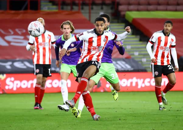 Wembley target: Sheffield United’s Max Lowe gets in a shot against Bristol City at Bramall Lane. Picture: Tim Goode/PA