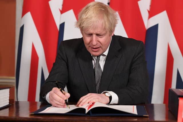 This was Boris Johnson signing the Brexit trade deal on December 30 in 10 Downing Street.