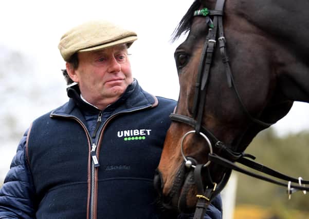 Trainer Nicky Henderson with dual Queen Mother Champion Chase hero Altior.