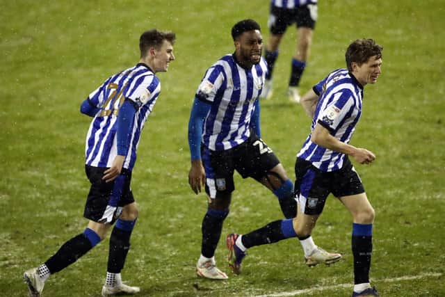 On target: Sheffield Wednesday's Adam Reach, right,  celebrates scoring against Wycombe. Picture: Tim Goode/PA