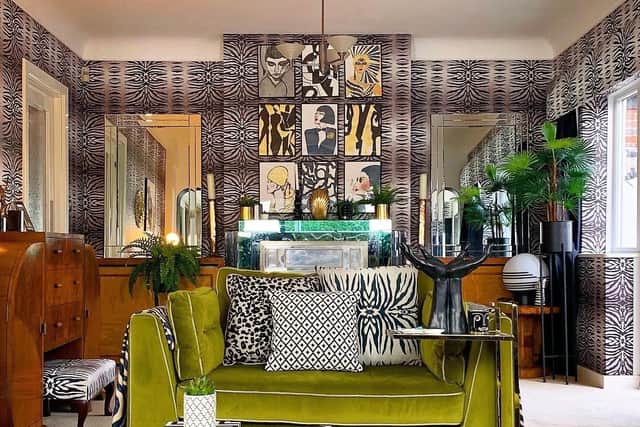 The sitting room with the Art Deco fireplace sourced via Instagram