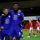 Chelsea's Tammy Abraham (right) celebrates with team-mate Reece James after scoring the winner against Barnsley.